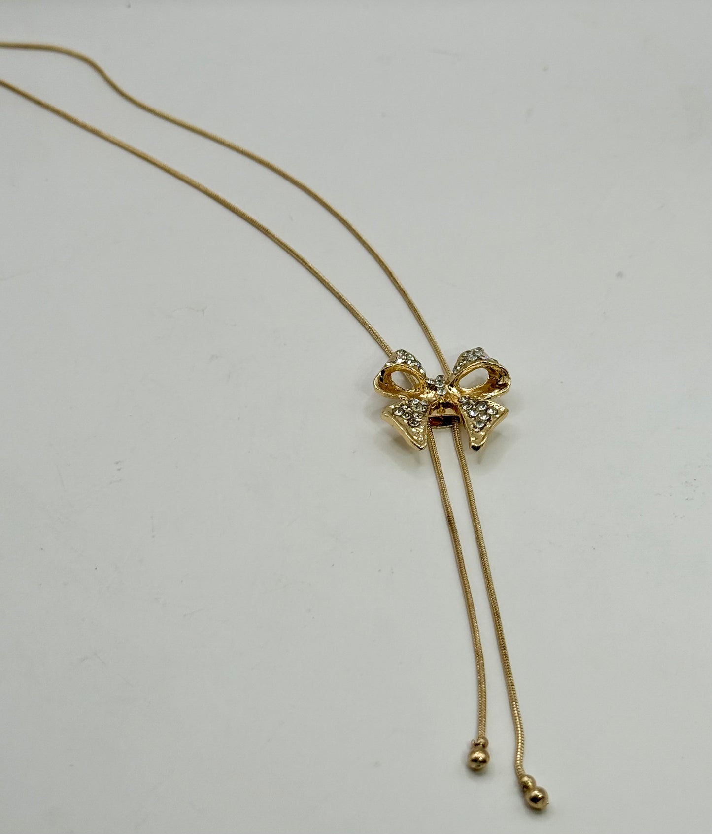 Crystal Bow Pendant Necklace – 22” Gold Chain, Sparkling Ribbon Necklace, Elegant Gift for Her