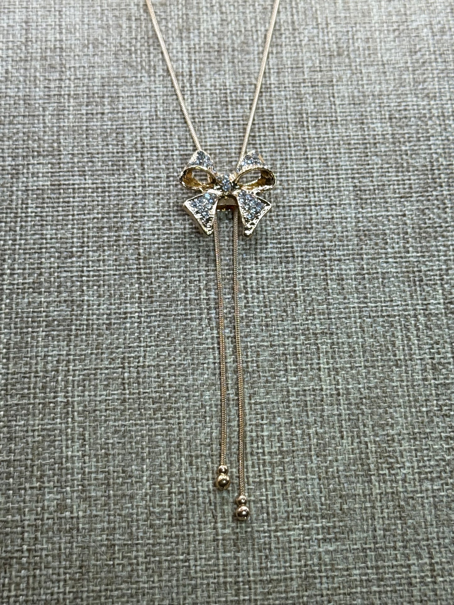 Crystal Bow Pendant Necklace – 22” Gold Chain, Sparkling Ribbon Necklace, Elegant Gift for Her