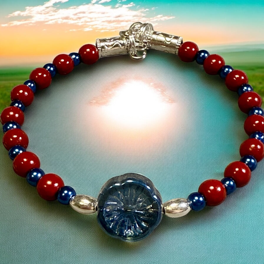 Red and Blue Glass bead bracelet with iridescent electroplated flower focal 7.5"