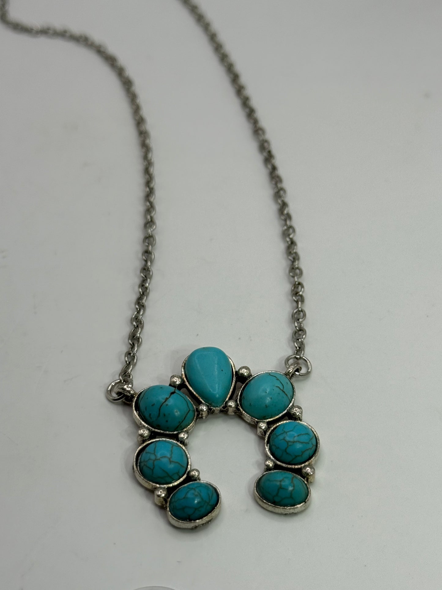 Turquoise Howlite Squash Blossom Necklace ā 18ā Silver Chain