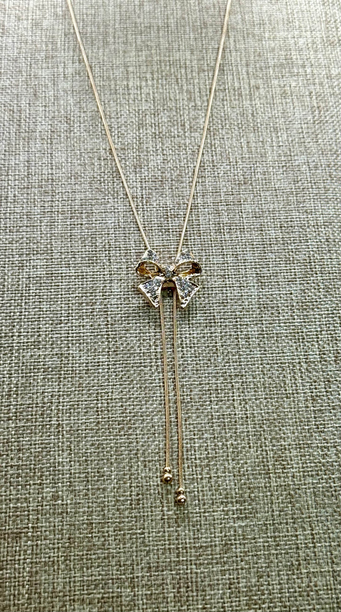 Crystal Bow Pendant Necklace – 22” Gold Chain, Sparkling Ribbon Necklace, Elegant Gift for Her