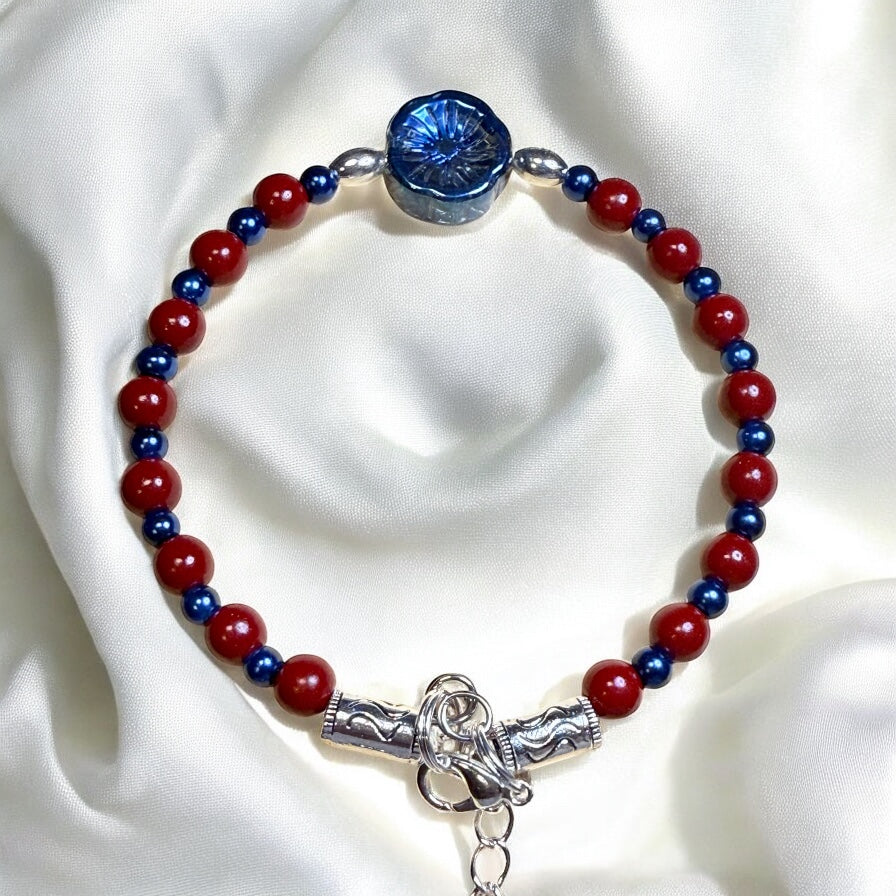 Red and Blue Glass bead bracelet with iridescent electroplated flower focal 7.5"