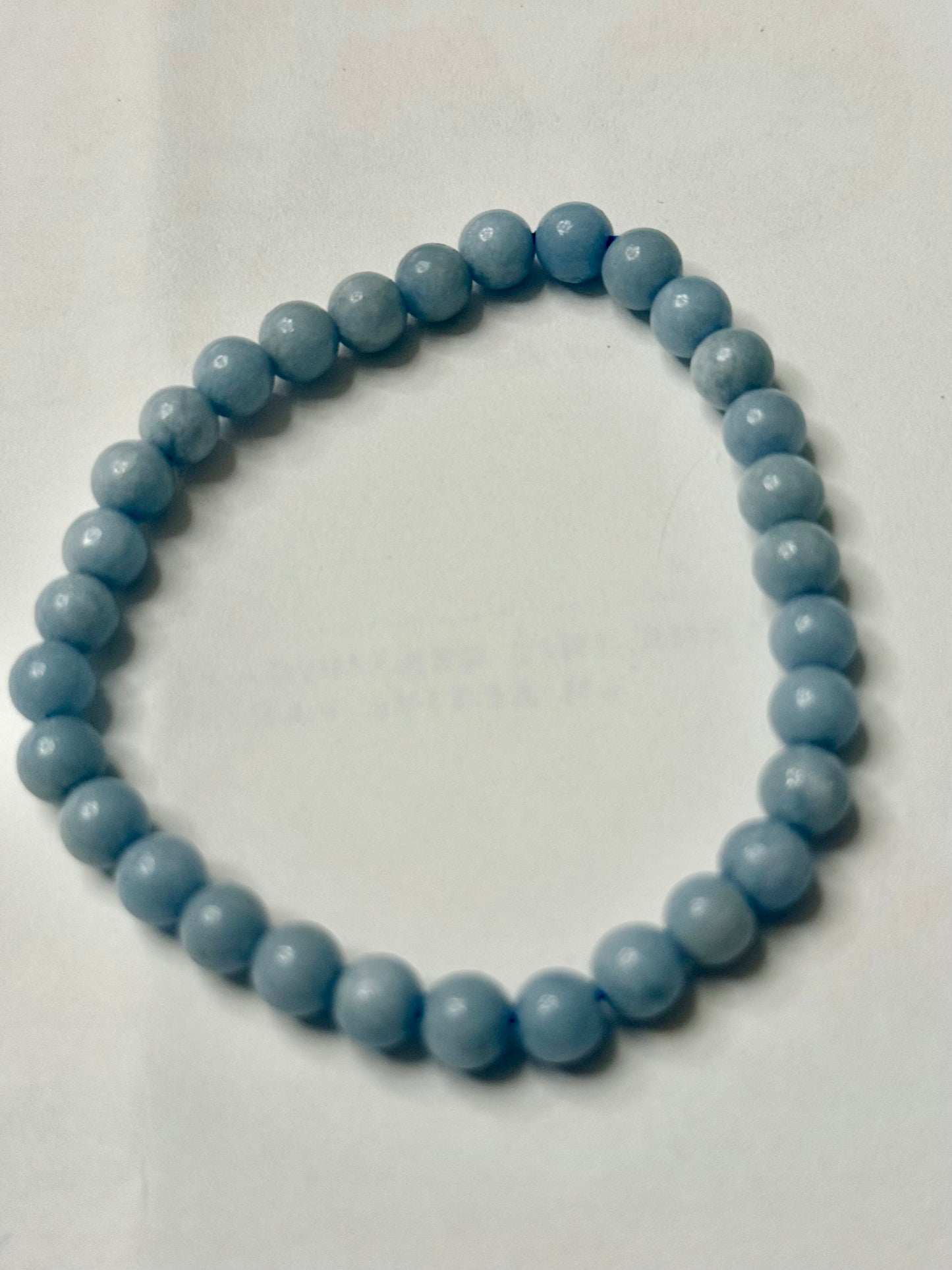 DESTASH - 6mm Angelite AAA quality. 30 beads to strand.