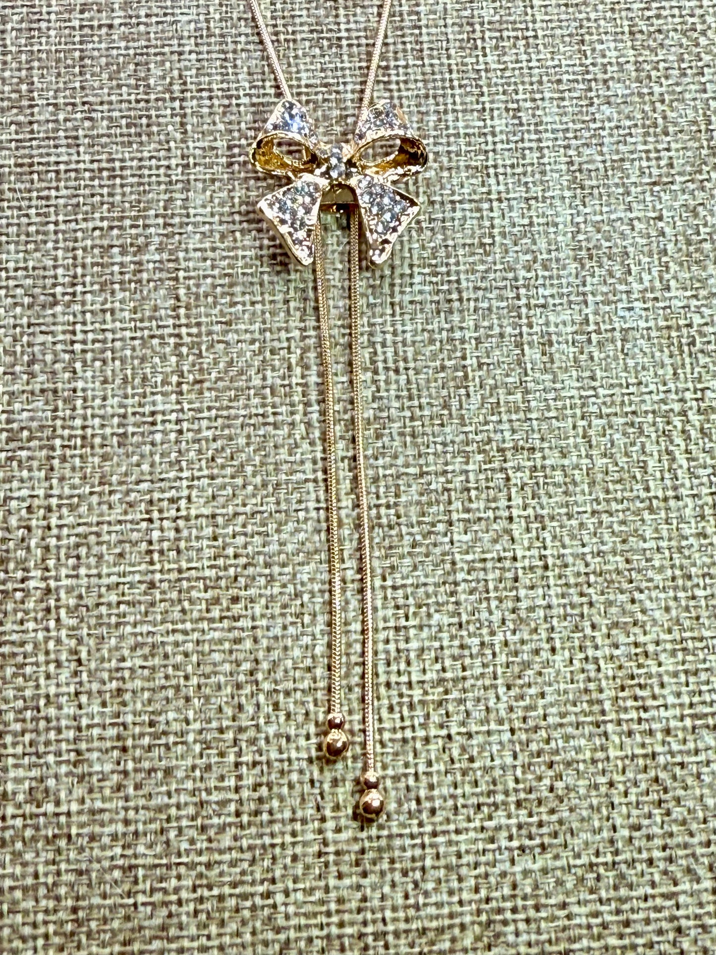 Crystal Bow Pendant Necklace – 22” Gold Chain, Sparkling Ribbon Necklace, Elegant Gift for Her