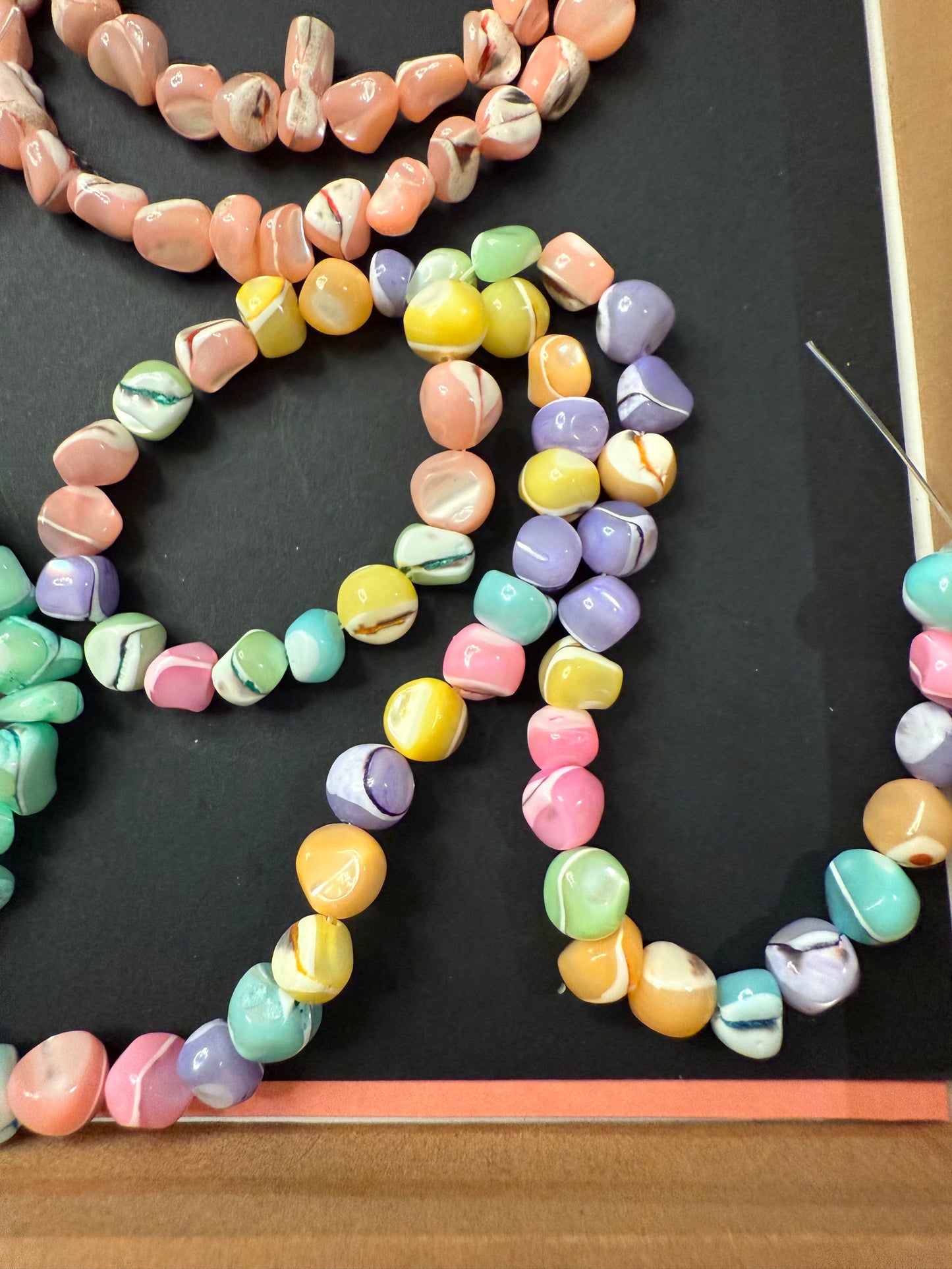 DESTASH -Shell Dyed - Vibrant Colors.  Approximate 50 beads per strand.