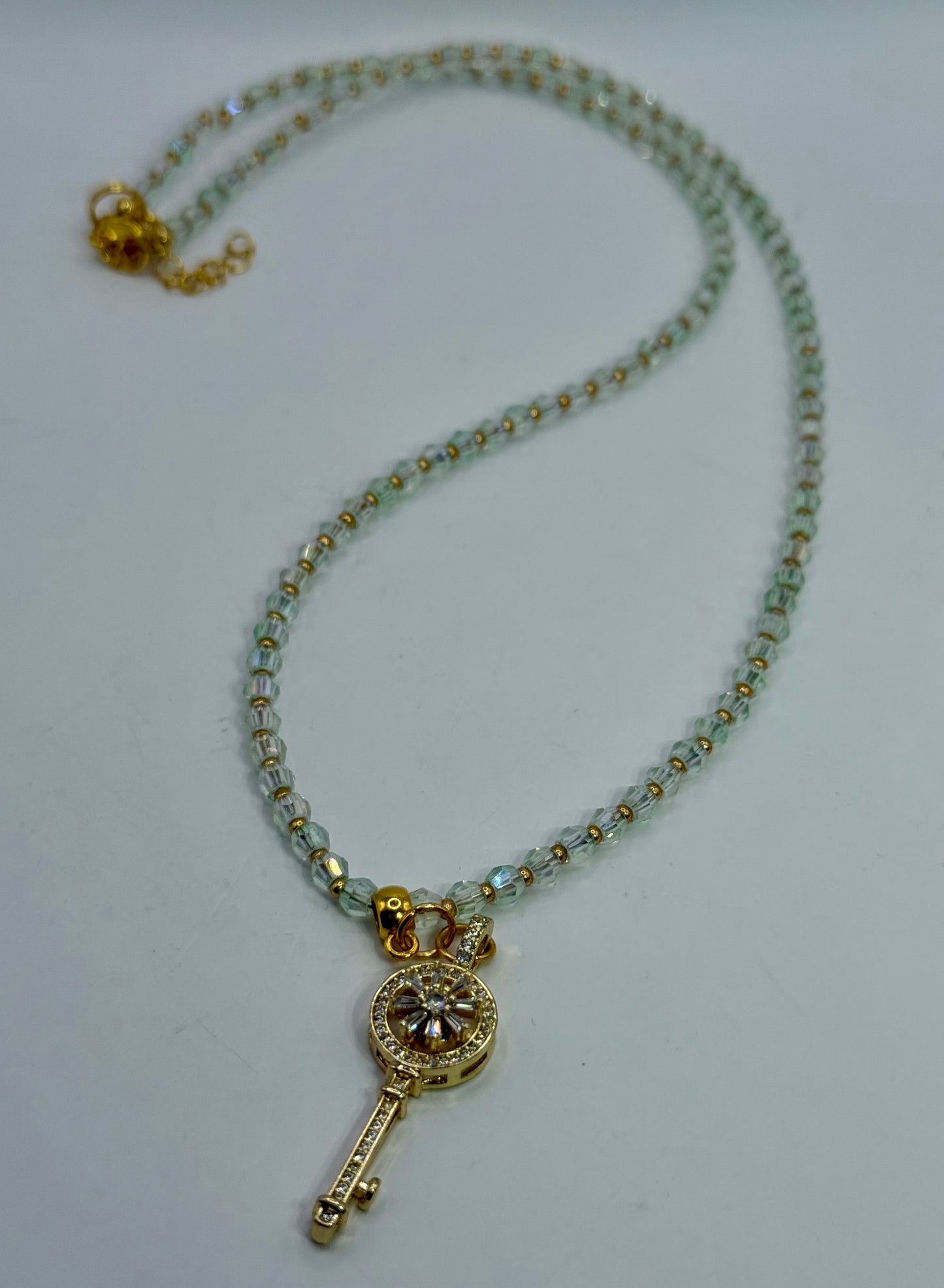 Gold Key Pendant Necklace – 20” Light Green Zircon Necklace with Spinner Key Charm, Elegant Crystal Beaded Jewelry, Gift for Her