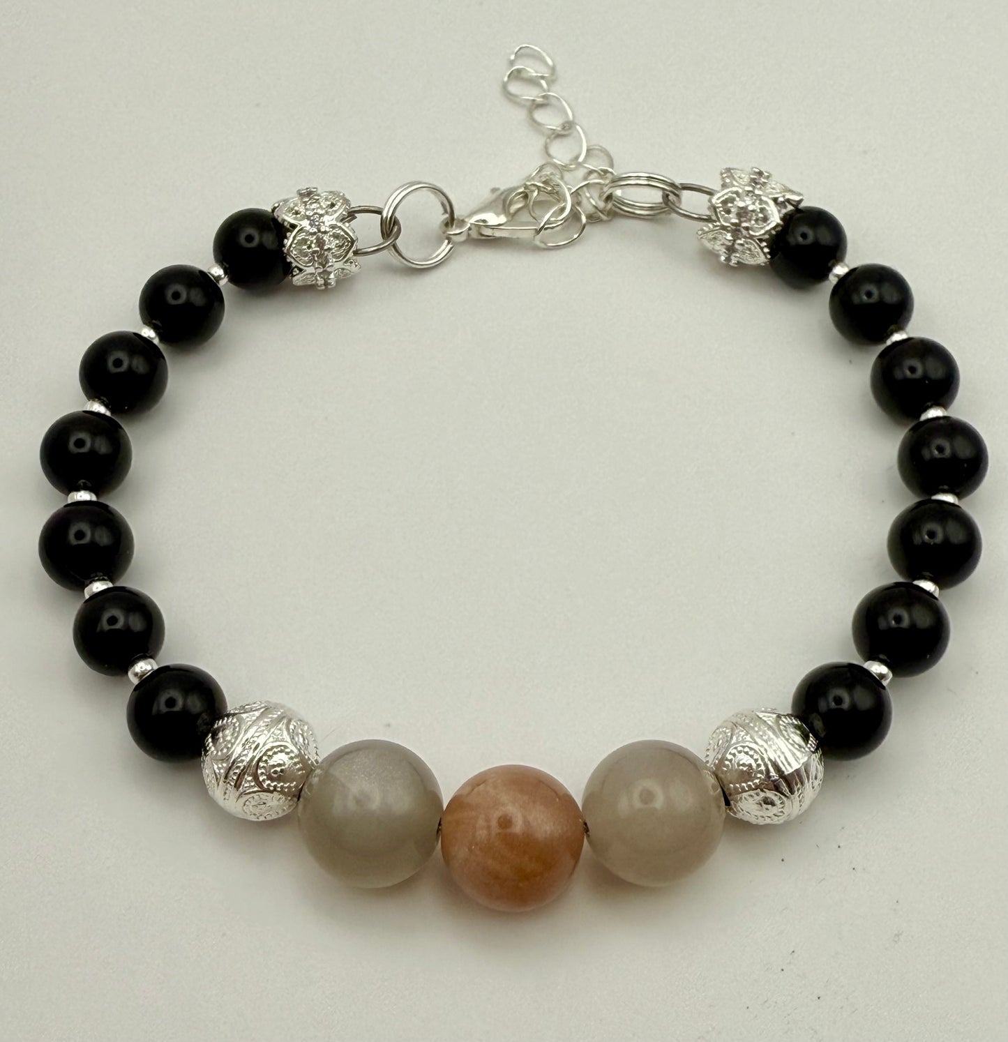 Onyx Bracelet with black and pink moonstone focal 7.25-7.5"
