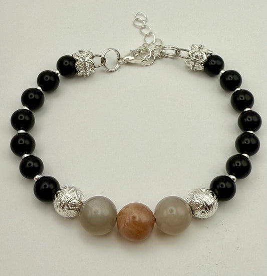 Onyx Bracelet with black and pink moonstone focal 7.25-7.5"