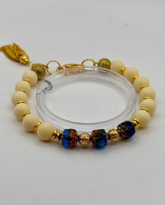 Yellow Tagua and Green Latern Focals with Golden Tassel Bracelet 7.5"