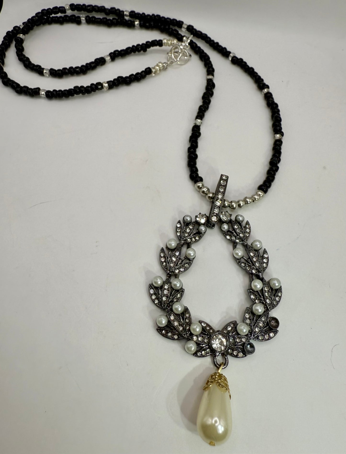 Elegant 26” Black Beaded Necklace with Vintage Wreath Pendant & Pearl Drop