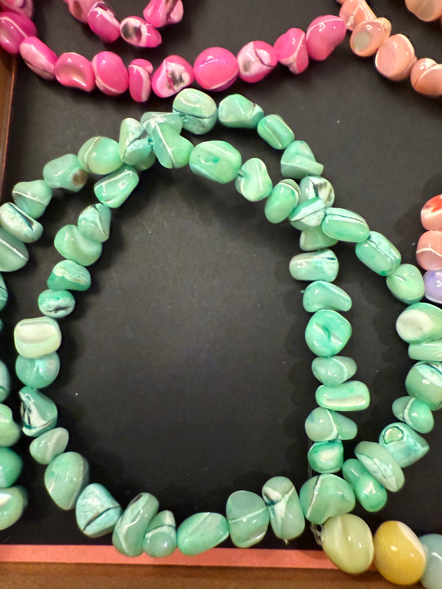 DESTASH -Shell Dyed - Vibrant Colors.  Approximate 50 beads per strand.