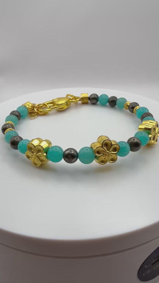 Amazonite and Pyrite Bracelet with golden flower accents 7.5"